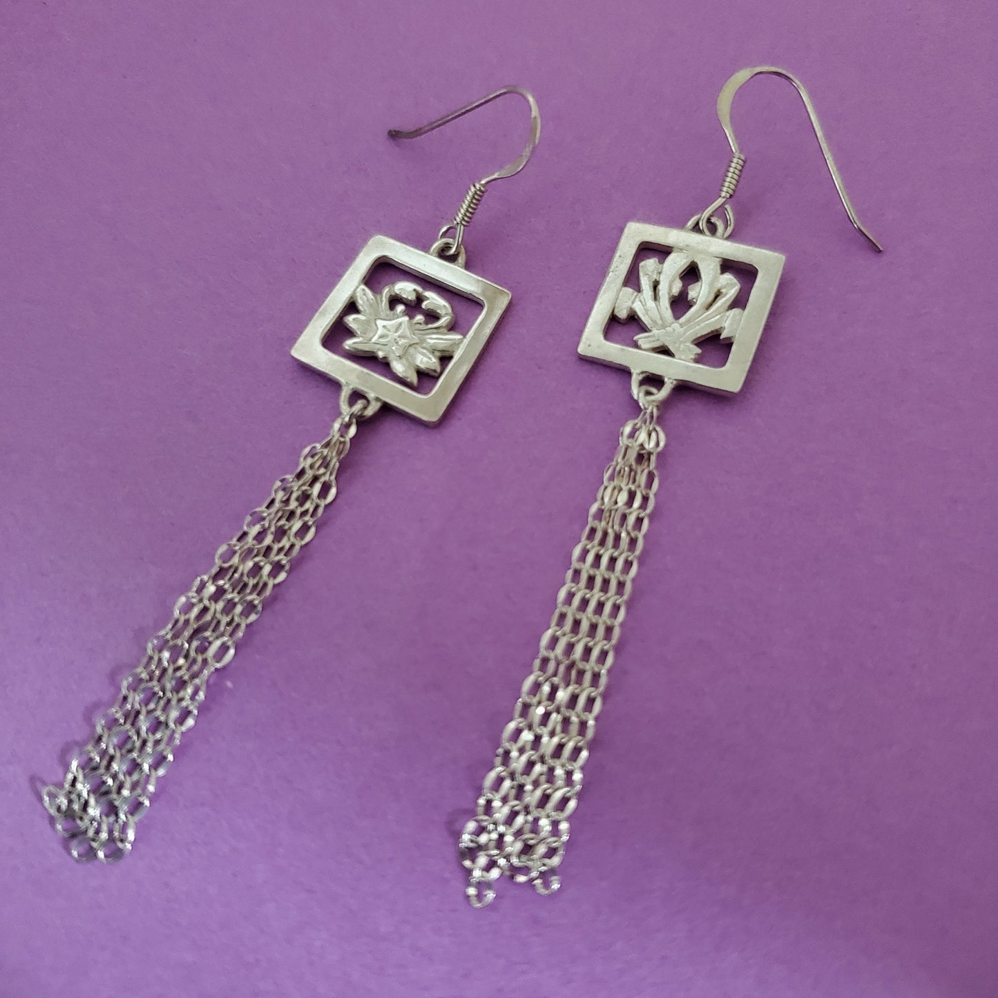 家紋ピアス (蟹竜胆×熨斗)