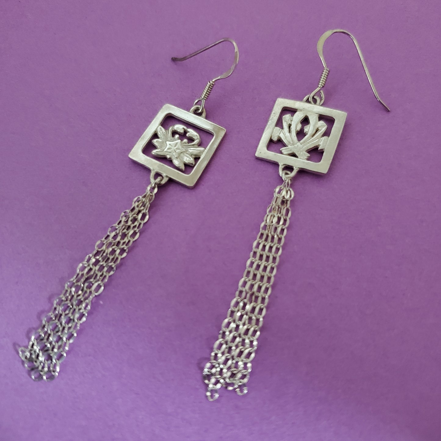 家紋ピアス (蟹竜胆×熨斗)